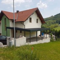 Carport mit Hauseingangsüberdachung