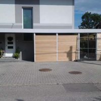 Carport mit Sicht und Windschutz in Lärchen Rohmbus